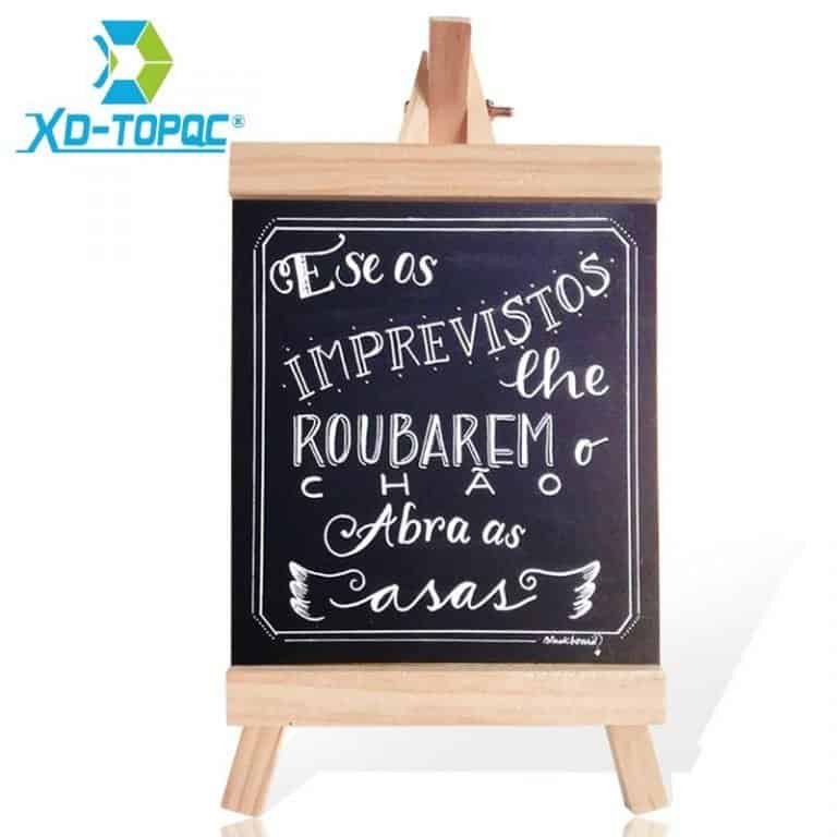 Wooden desktop blackboard for writing motivational phrases