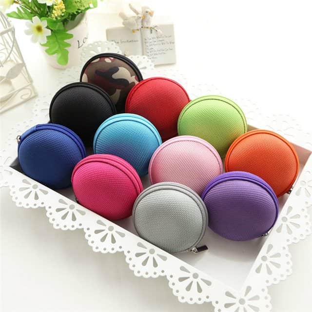 Eleven earphones storage bags of different colors in a white box
